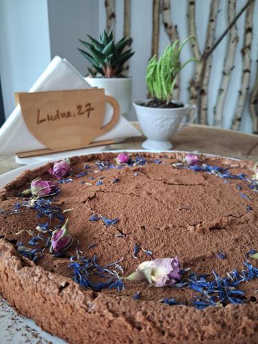 a chocolate cake sitting on top of a table at Ludna 27 in Niechorze