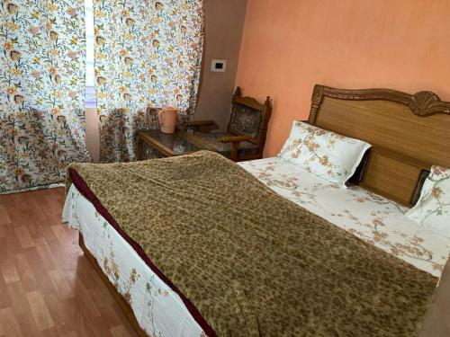 Ένα ή περισσότερα κρεβάτια σε δωμάτιο στο Hotel TAUHURA