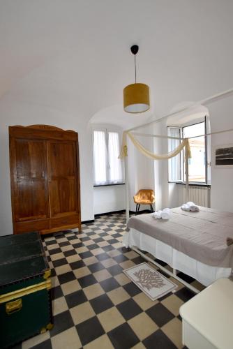 Una cama o camas en una habitación de Casa Mare Pici - Garage - Spiagge a 200mt