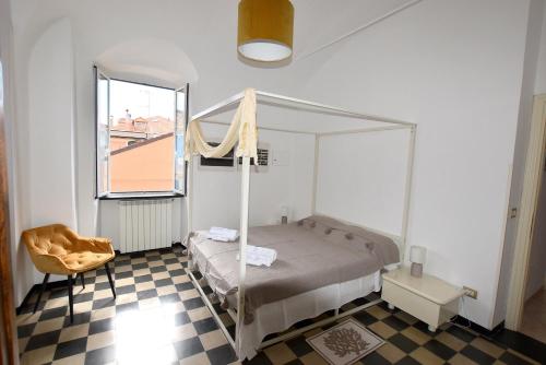 Una cama o camas en una habitación de Casa Mare Pici - Garage - Spiagge a 200mt