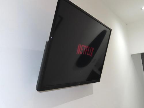 a television with the words respawn on the screen at 6 Mins to NEC & BHX Apartment with FREE Parking in Sheldon