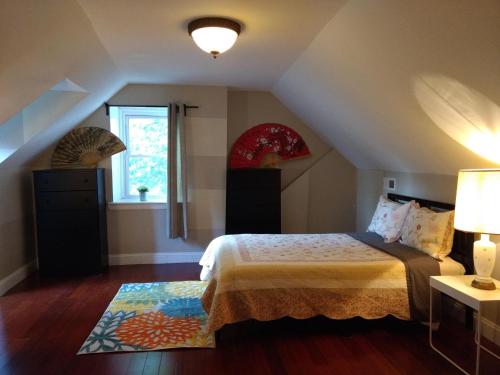 a bedroom with a bed and a window at Fairmount House Free Street Parking Quiet Spacious in Philadelphia