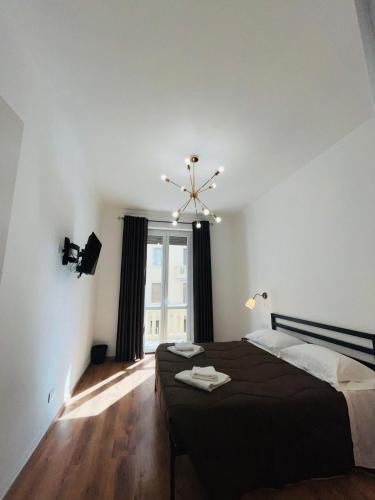 Кровать или кровати в номере Oriani Central Rooms