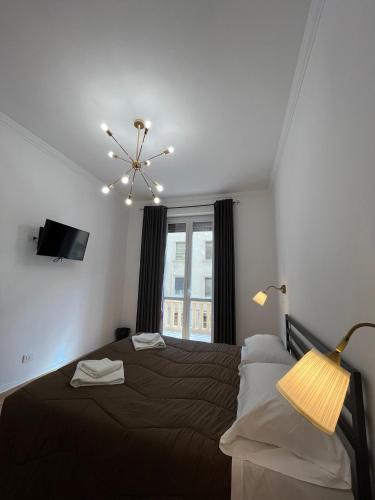 Кровать или кровати в номере Oriani Central Rooms
