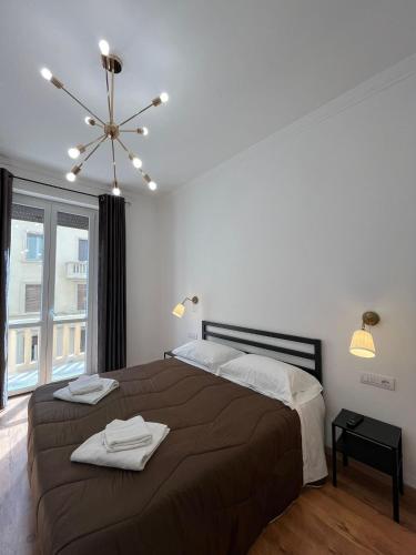 Кровать или кровати в номере Oriani Central Rooms