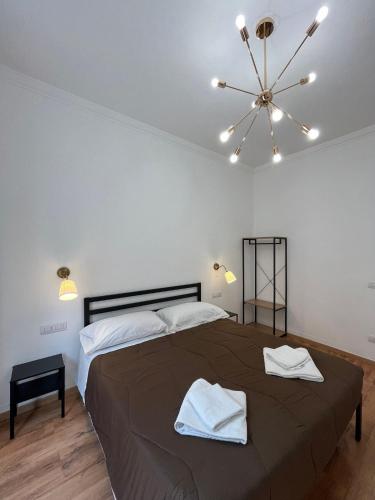 Кровать или кровати в номере Oriani Central Rooms