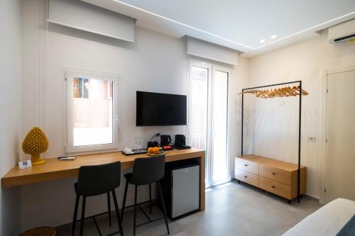 TV a/nebo společenská místnost v ubytování Al Capo Suite Home