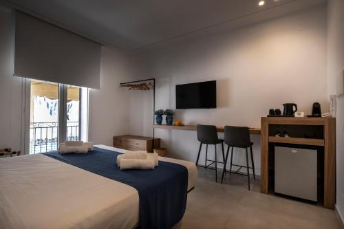 Postel nebo postele na pokoji v ubytování Al Capo Suite Home