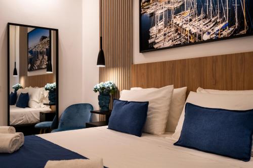 Postel nebo postele na pokoji v ubytování Al Capo Suite Home