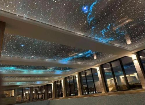 a starry sky mural on a ceiling in a building at Una LUX N85 in Kopaonik