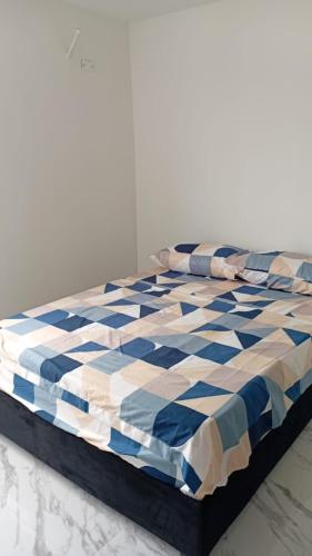 En eller flere senge i et værelse på Lotus 15-02 Cartagena