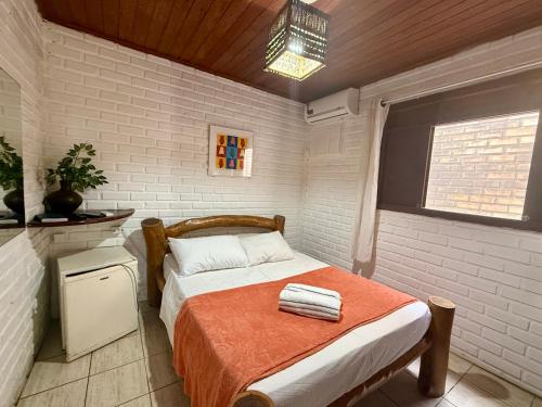 Ένα ή περισσότερα κρεβάτια σε δωμάτιο στο Oceana Suites Villas de Tibau