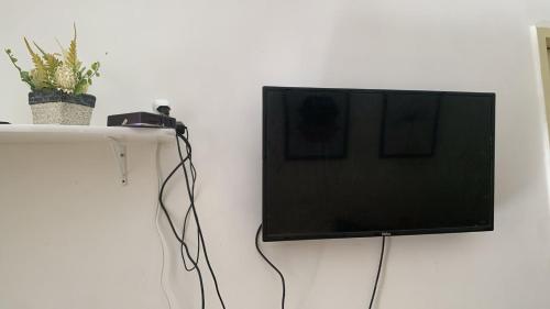 TV/trung tâm giải trí tại Pousadinha Mel -DORMITÓRIOS 01