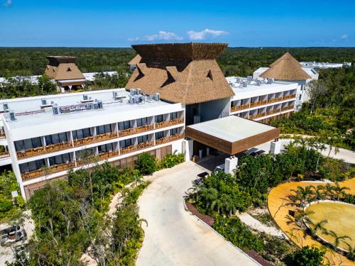 an overhead view of a building with a roof at Hotel Mundo Maya Tulum in Tulum