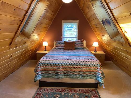 Ένα ή περισσότερα κρεβάτια σε δωμάτιο στο Valley Chalet