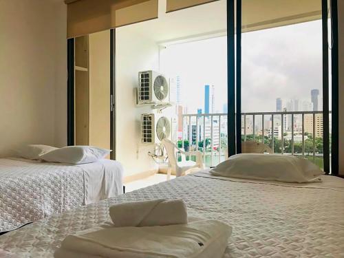 Una cama o camas en una habitación de Vive 801