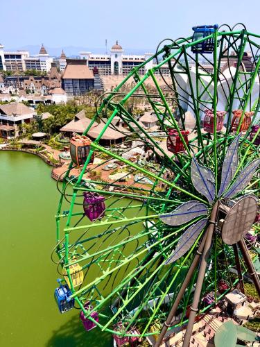 a ferris wheel in the water at a carnival at Mayan Palace, Grand Mayan, Luxury Beachfront 2BR Condo, Nuevo Vallarta in Nuevo Vallarta 