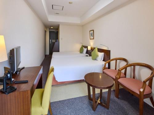 Μια τηλεόραση ή/και κέντρο ψυχαγωγίας στο Hotel Yugaf Inn Okinawa
