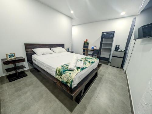 Postel nebo postele na pokoji v ubytování Hotel Uvita Forest