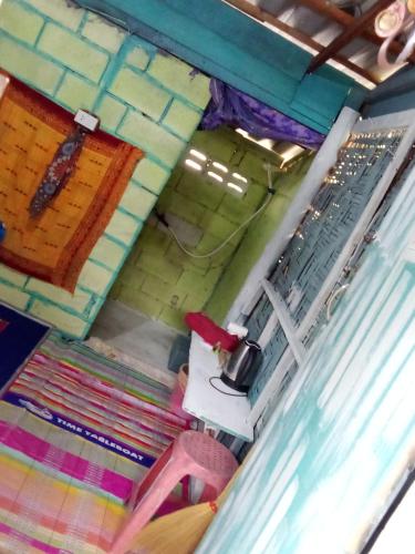 an overhead view of a room with a table and a table at The Rock Hut in Ko Lanta