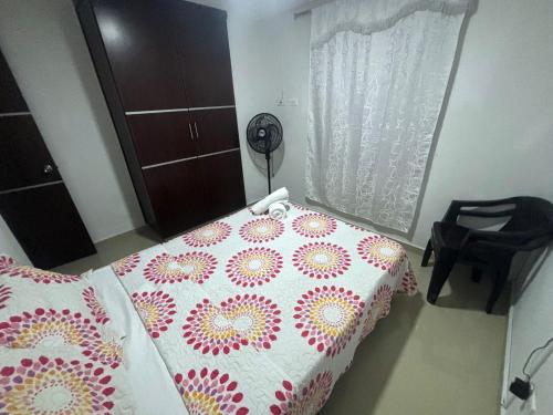 Ένα ή περισσότερα κρεβάτια σε δωμάτιο στο Exclusivo Apartamento Plaza Con Piscina