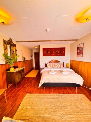 Ein Bett oder Betten in einem Zimmer der Unterkunft Hotel Brú countryside