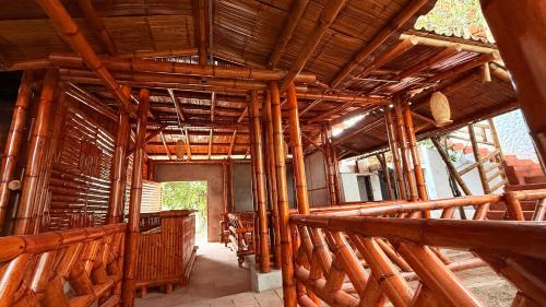an inside view of a building with wooden beams at Hotel Sol del Desierto in Villavieja