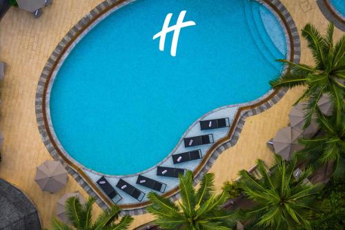 an overhead view of a swimming pool at a resort at Holiday Inn Resort Krabi Ao Nang Beach by IHG in Ao Nang Beach