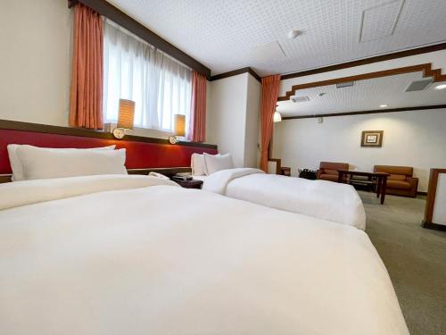 Guide Hotel Changhua Jhongjhengにあるベッド