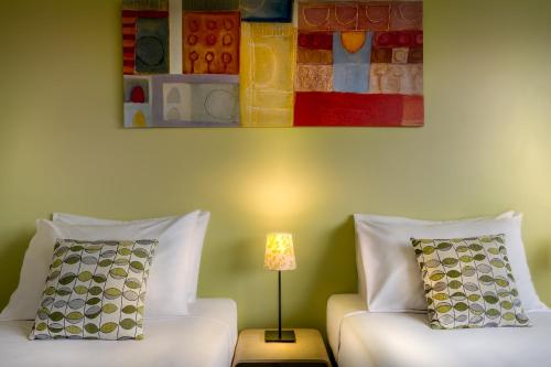 Ένα ή περισσότερα κρεβάτια σε δωμάτιο στο Birches Serviced Apartments