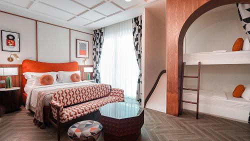 เตียงในห้องที่ Sugar Marina Hotel -POP- Kata Beach