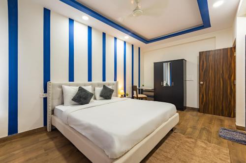 Postel nebo postele na pokoji v ubytování 2BHK Homestay in Candolim