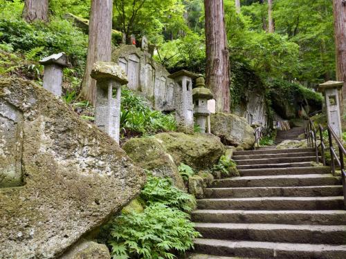 a set of stone stairs in a cemetery at Hotel Green Selec in Sendai