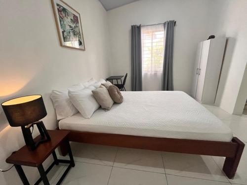 Postel nebo postele na pokoji v ubytování EBK Surf Apartamento 1