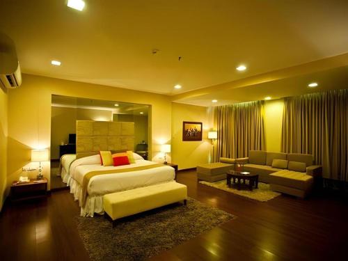 Ένα ή περισσότερα κρεβάτια σε δωμάτιο στο People's Hotel