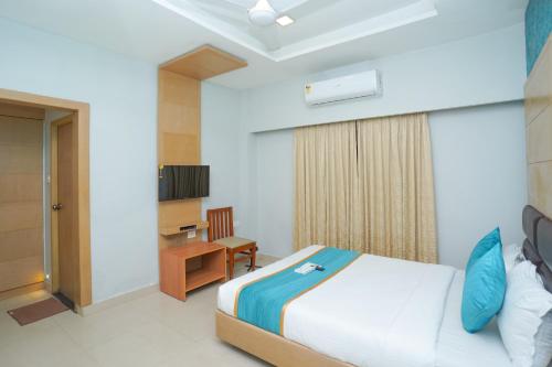 Ένα ή περισσότερα κρεβάτια σε δωμάτιο στο Hotel Zain Grande
