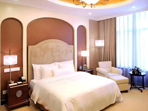 Letto o letti in una camera di Urumqi Tianyuan Hotel