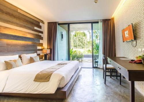 Postel nebo postele na pokoji v ubytování B2 Pai Premier Resort