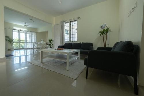 Galería fotográfica de Minimal & Cozy 3BHK Retreat en Thiruvananthapuram