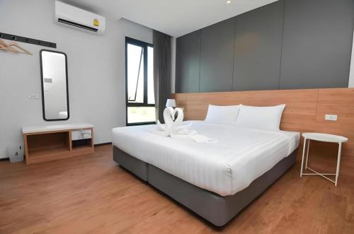 Voodi või voodid majutusasutuse Boondara Boutique Hotel toas