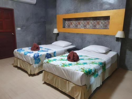 Letto o letti in una camera di Saikaew Boutique Hotel