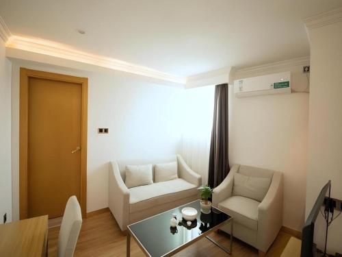 Χώρος καθιστικού στο GreenTree Inn Qingyuan Qinghe Avenue Branch