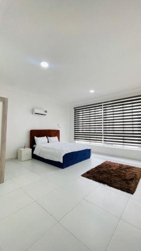 Ένα ή περισσότερα κρεβάτια σε δωμάτιο στο 1-Bedroom Comfort Loft