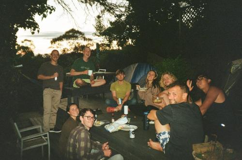 a group of people posing for a picture at Flying Fox Backpackers in Katoomba
