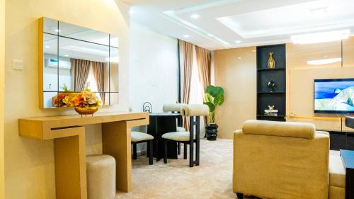 Μια τηλεόραση ή/και κέντρο ψυχαγωγίας στο Eava Maison Apartments