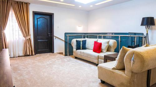 Χώρος καθιστικού στο Eava Maison Apartments