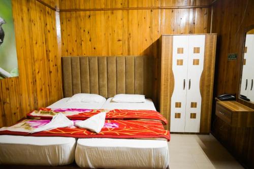 Postel nebo postele na pokoji v ubytování Aranya Jungle Resorts