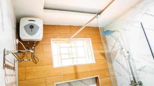 Ένα μπάνιο στο Eava Maison Apartments