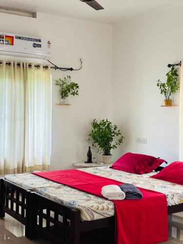 Cama o camas de una habitación en Villa Luna Varkala