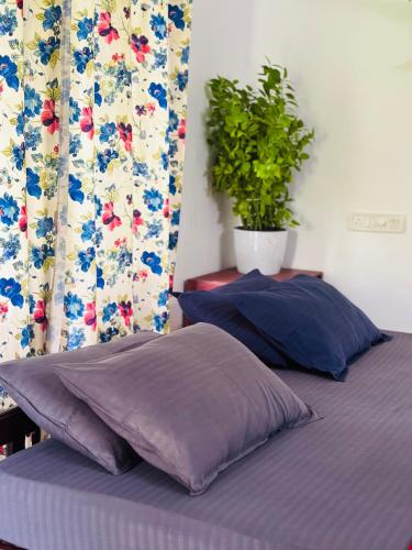 Cama o camas de una habitación en Villa Luna Varkala